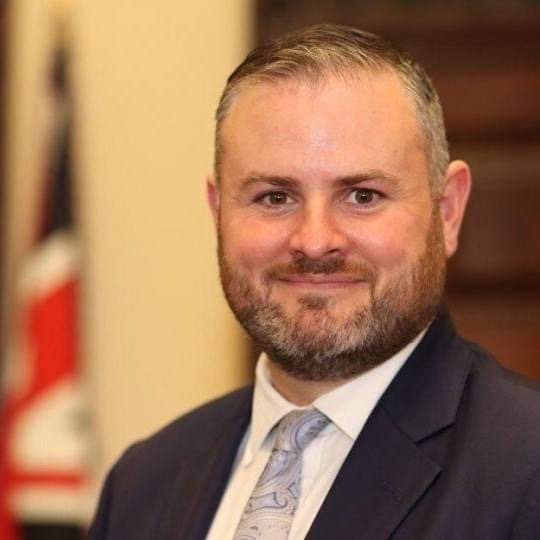 Headshot of Andrew Stephenson, Chair of UHMBT