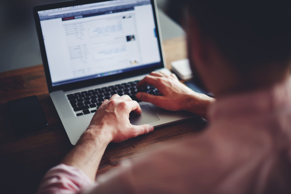 Shutterstock image of man using laptop.jpg