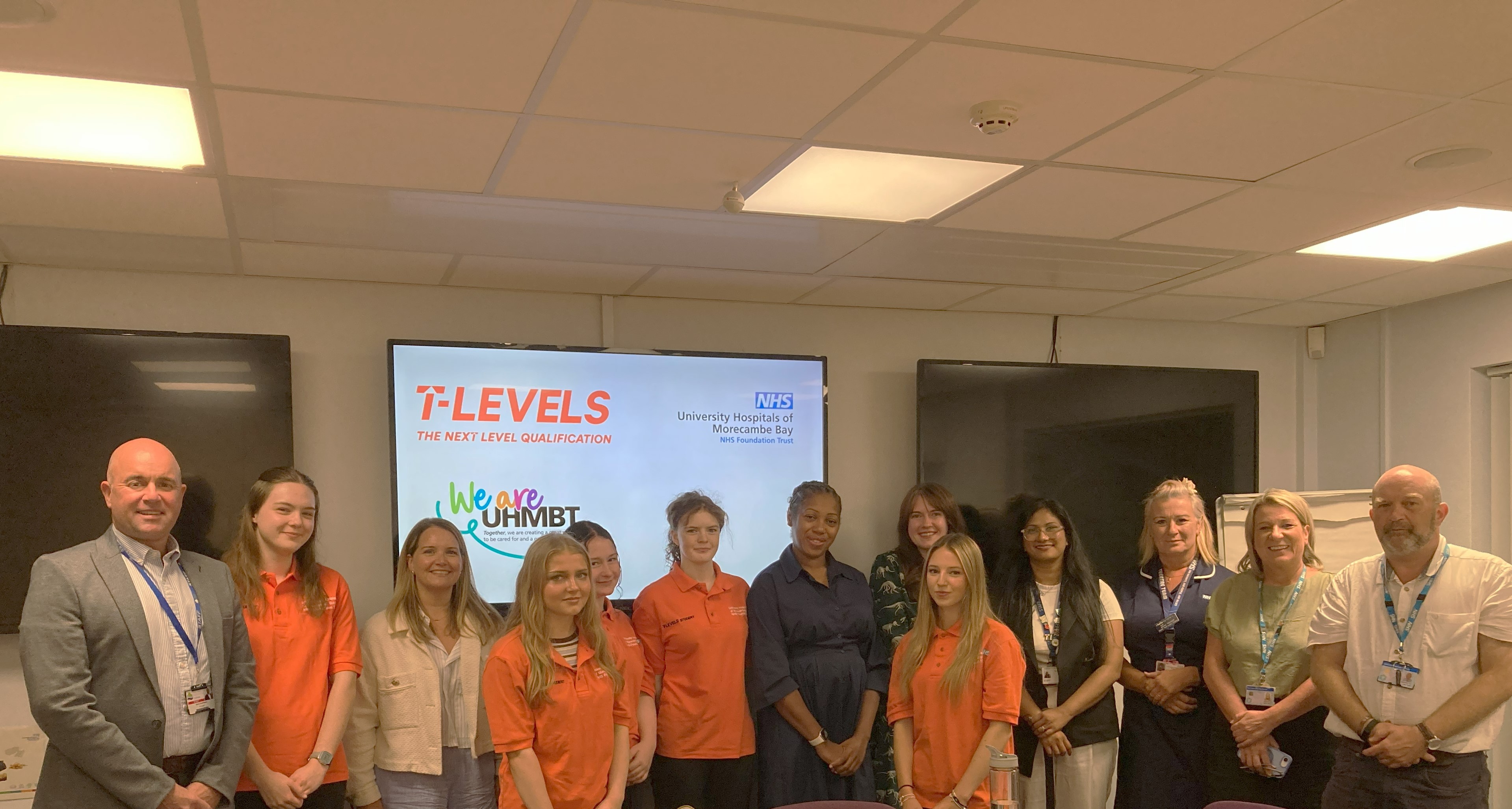 UHMBT staff with students and visitors from the North Central London Cancer Alliance with Iain Hook on the right.jpg