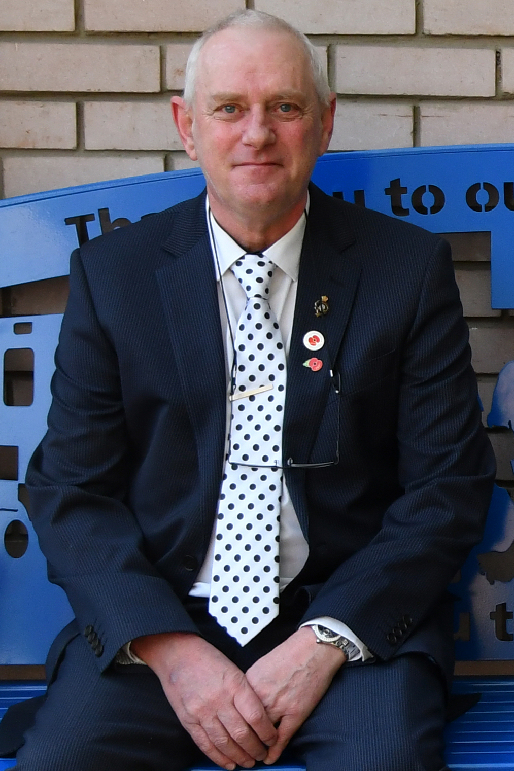 Photograph of bus driver Steve Trainor, who is learning to run again after having COVID