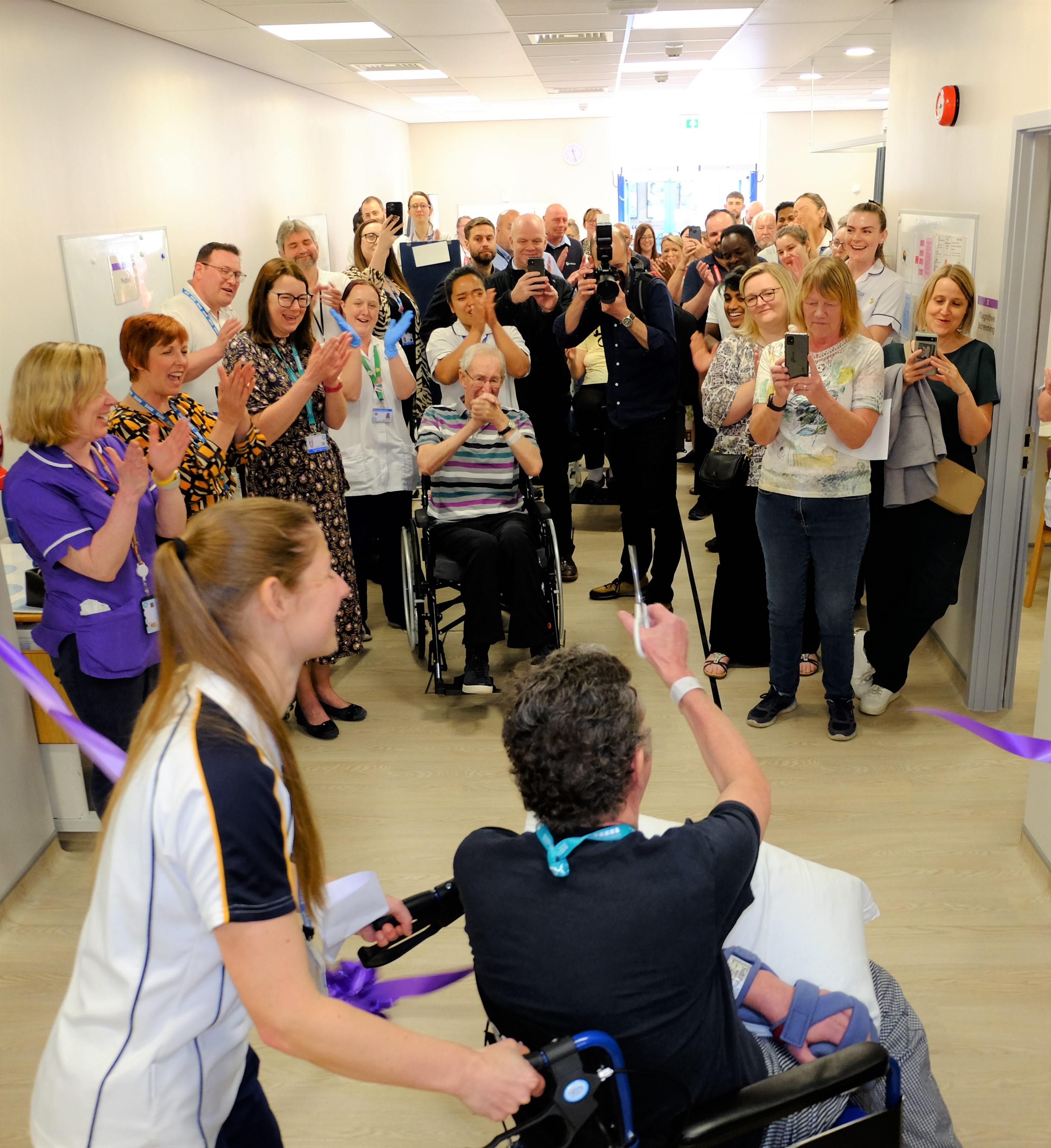 Cutting the ribbon Stroke Rehab Space UHMBT 2023.jpg