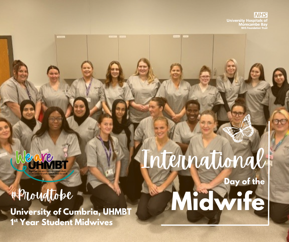 A group photo of around 20 student midwives in grey uniforms