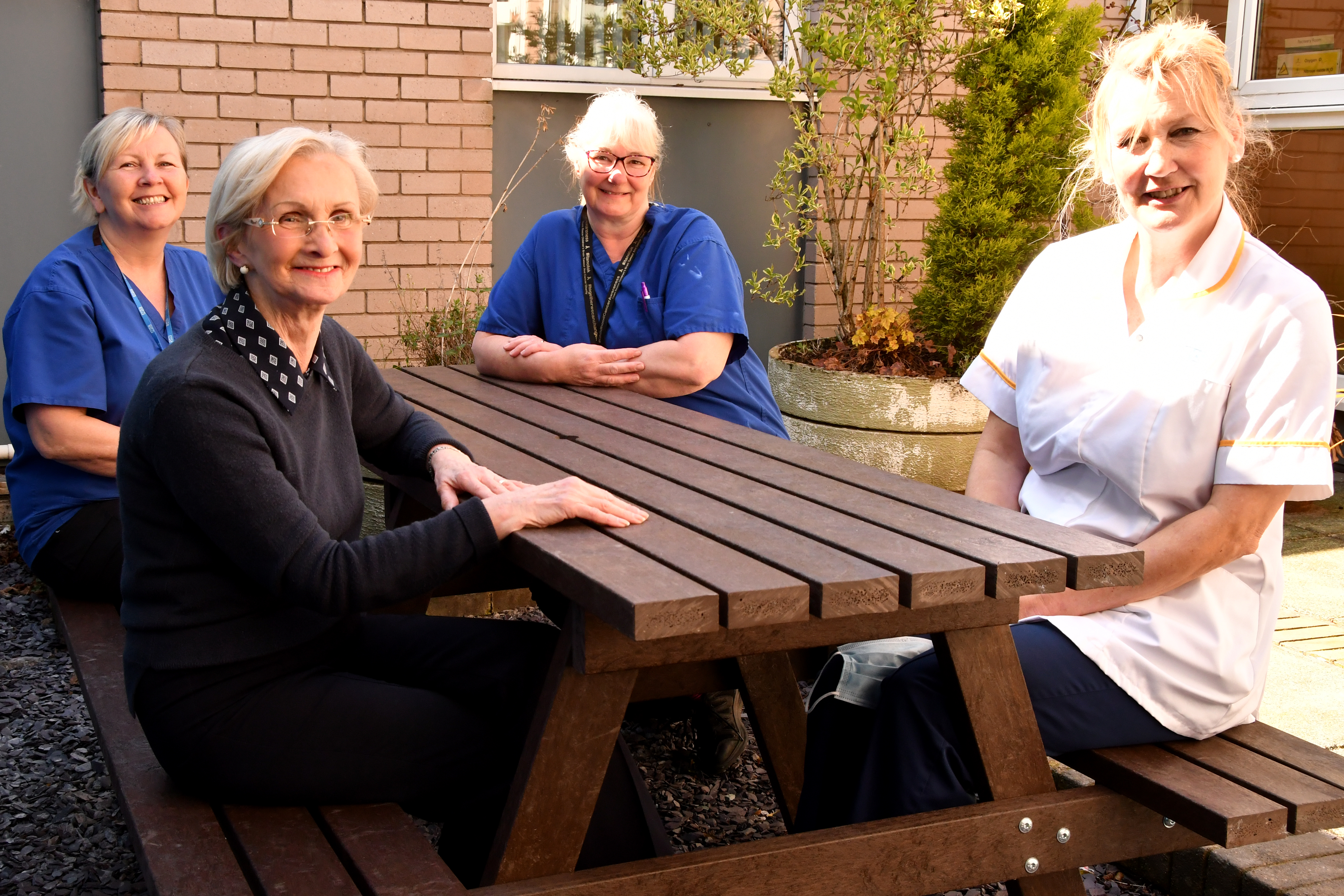 Dental Nurse Julie Atkin, Receptionist Hilary Freedman, Dental Nurse Anne Hughes and Senior dental Nurse Cecily Pike are pictured enjoying the new outdoor furniture at the Maxillofacial Department at Royal Lancaster Infirmary.