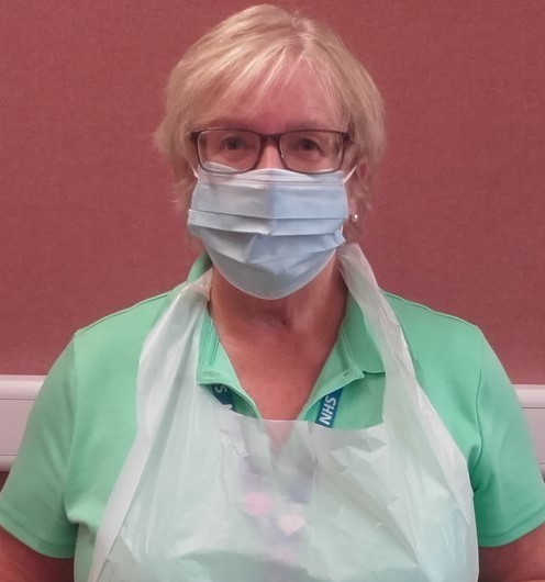 Ann Salisbury, childrens hearing with PPE.jpg
