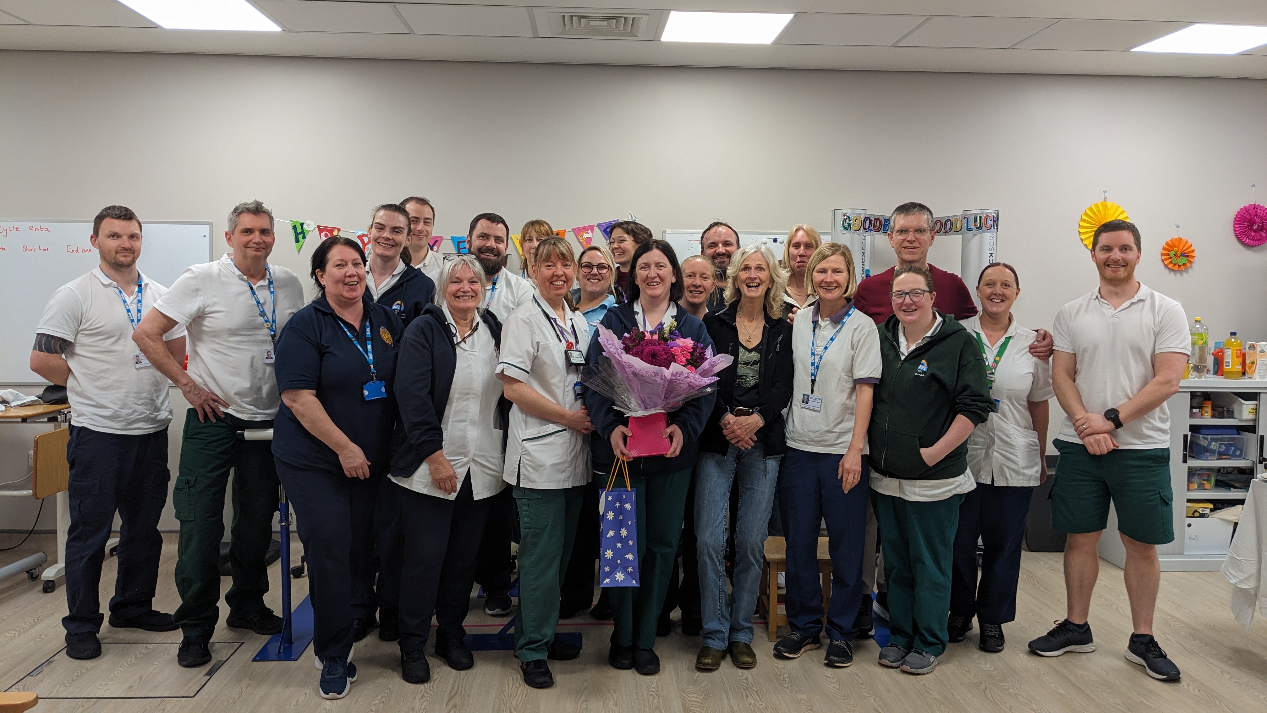 Group photo of stroke service colleagues smiling to camera