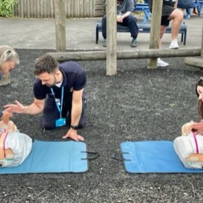 The Mayor of Lancaster and school staff take part in CPR training.jpg