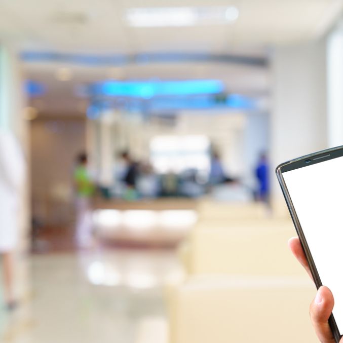 Shutterstock image of a phone in hospital setting